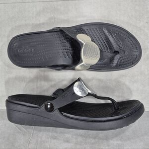 Crocs Sanrah thong sandals women's 8 black wedge heel metallic medallions FLAWS